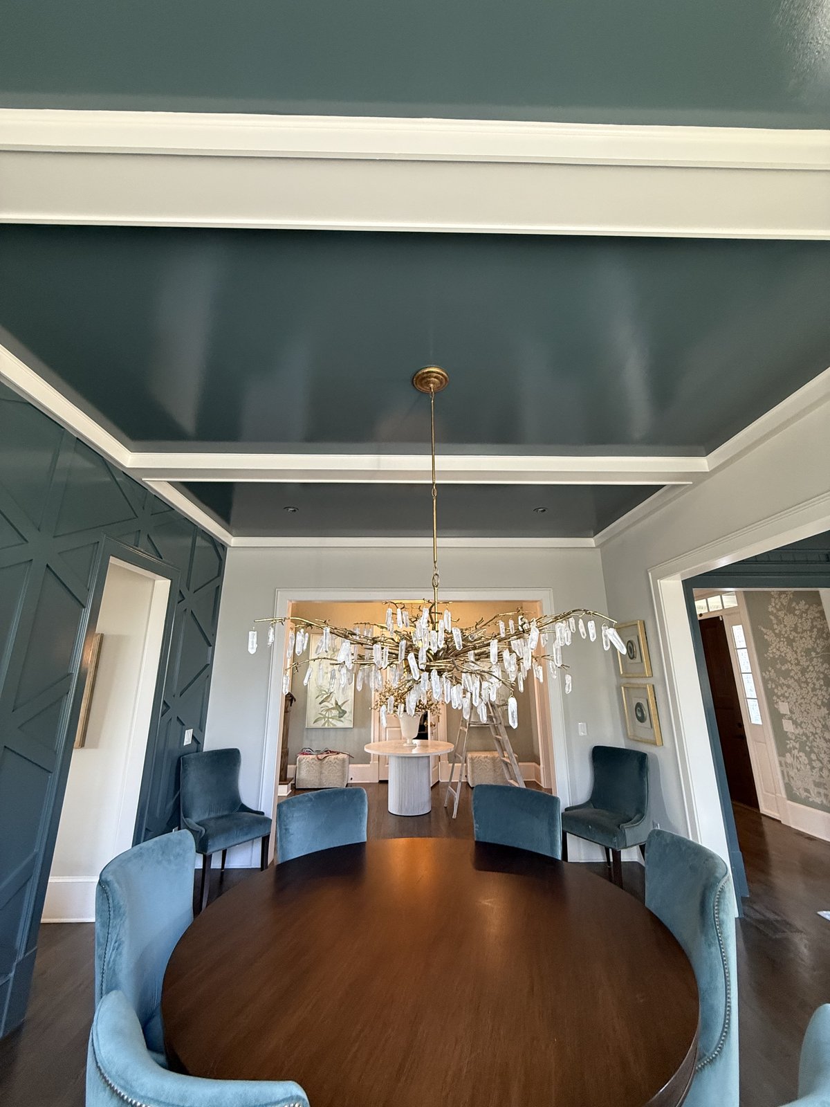 Sitting room repainted in deep navy with white millwork — Lou's Atlanta Painting