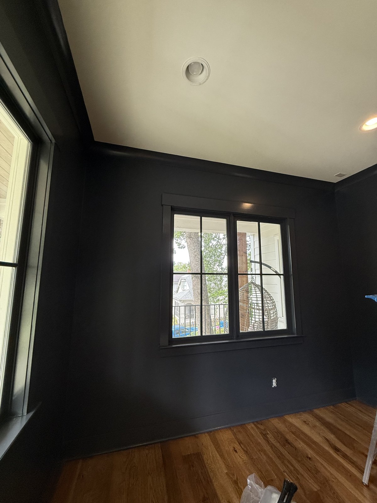 Bedroom freshly repainted in deep charcoal — Lou's Atlanta Painting